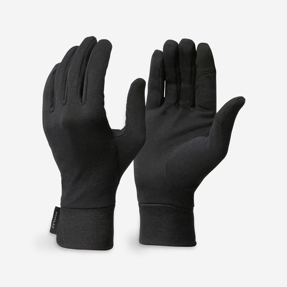 Pair of black gloves on a light gray background