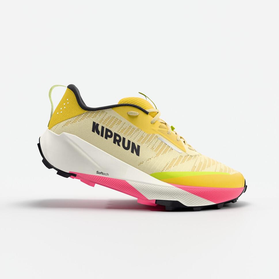 Yellow and pink running shoe with 'KIPRUN' branding on a white background